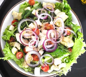 Ensalada pulcino alla milanesa