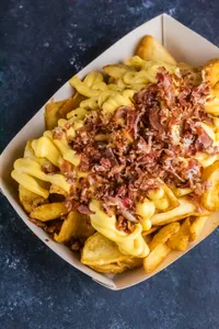Papas Rústicas con Cheddar & Bacon