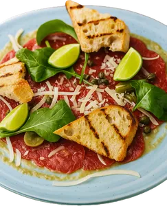 Carpaccio de filete sobre cremoso de berenjenas ahumadas
