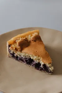 Porción Cheesecake de Arándano