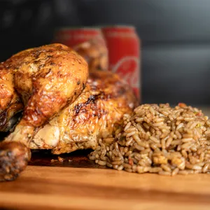 1/2 Pollo asado con arroz y bebidas