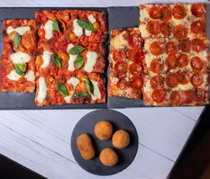 2 Pizzas y 4 suppli