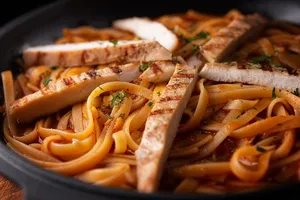 Tagliatelle Solomito de Cerdo Parrilla